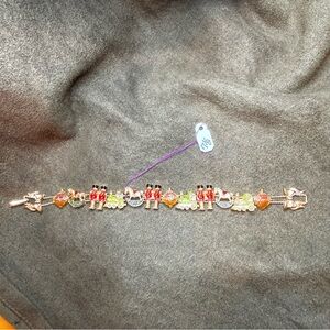 Avon Vintage Enamel Slider Charms Toys Train Christmas Gold Tone 7.5 Bracelet